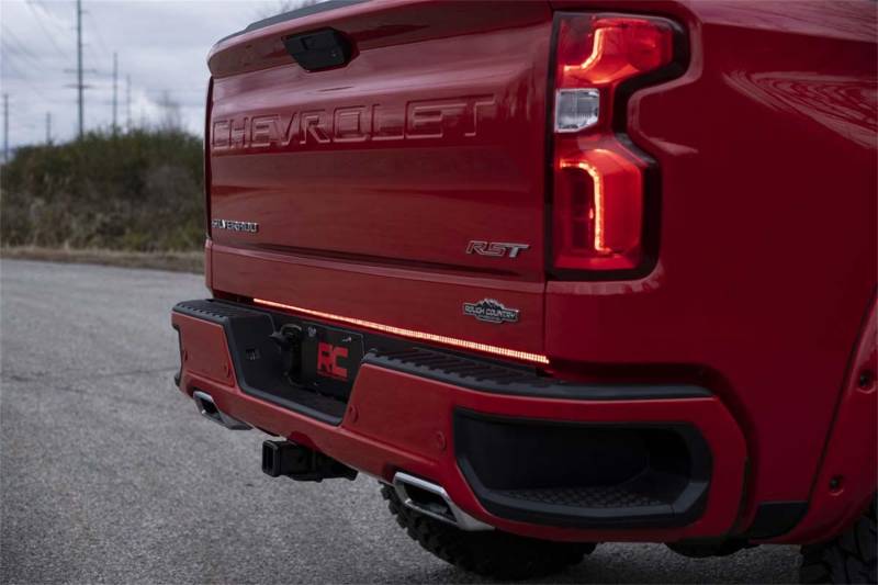 Rough Country 78860 tailgate LED strip installed on a red pickup truck