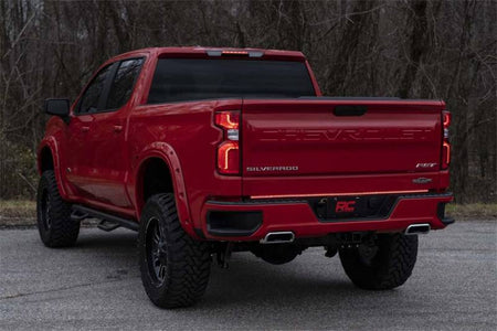 Rough Country quad-row tailgate light strip mounted between tailgate and bumper